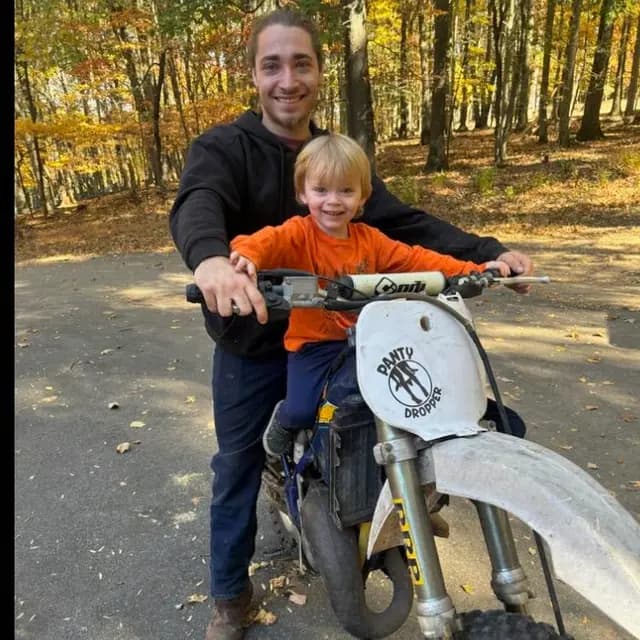 Kevin Hoffman with his son enjoying family time outdoors